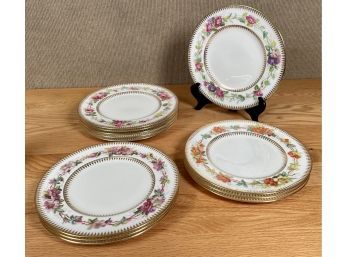 A fine set of 12 Cauldon porcelain plates