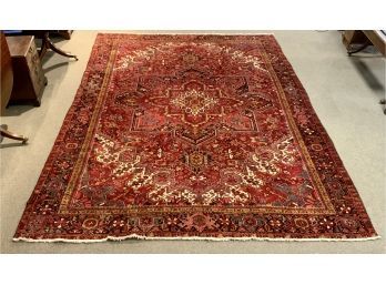 A vintage room size Heriz rug, primarily