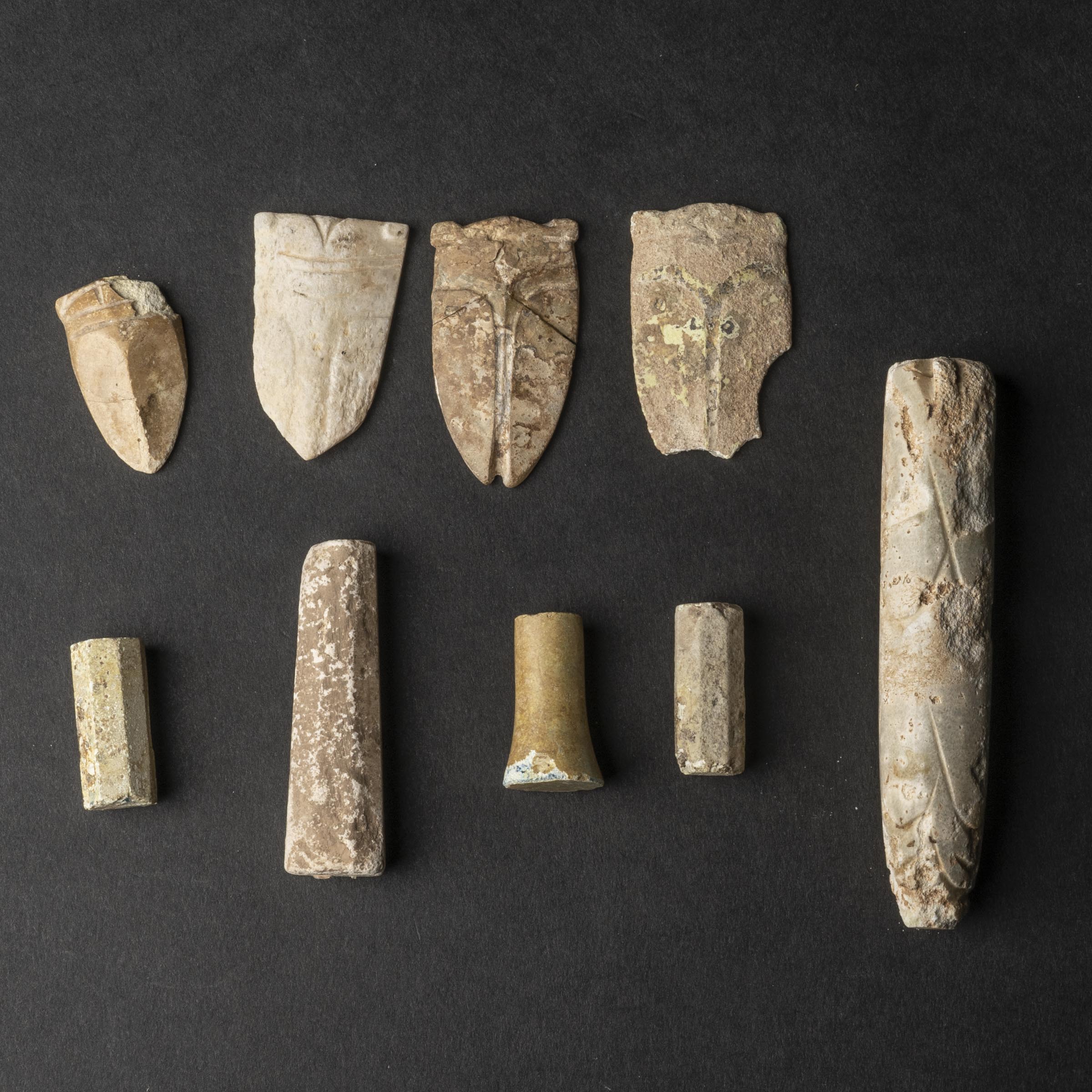 A Group of Nine Archaic Glass Burial