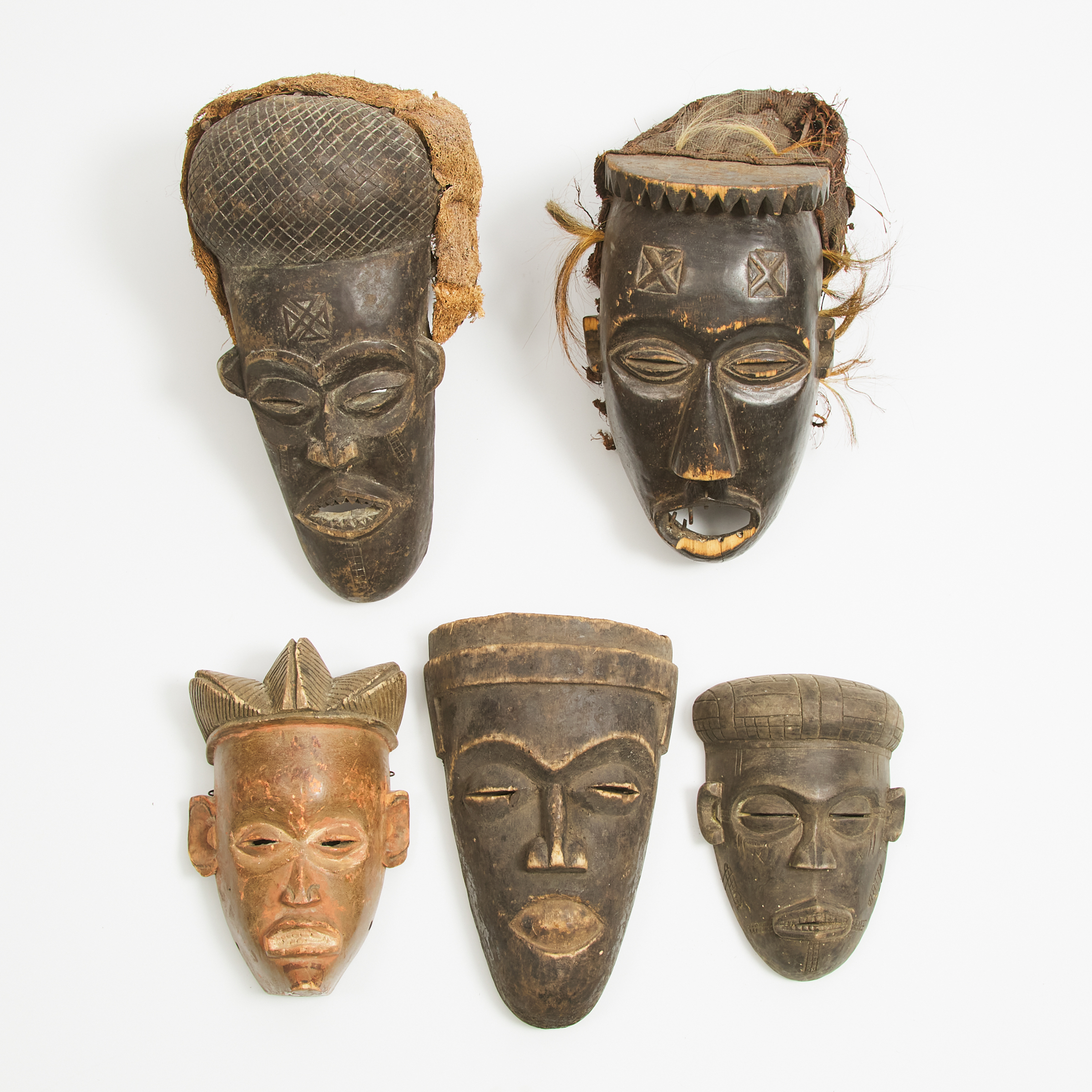 Five Chokwe Masks two with Headdresses  3ab81e