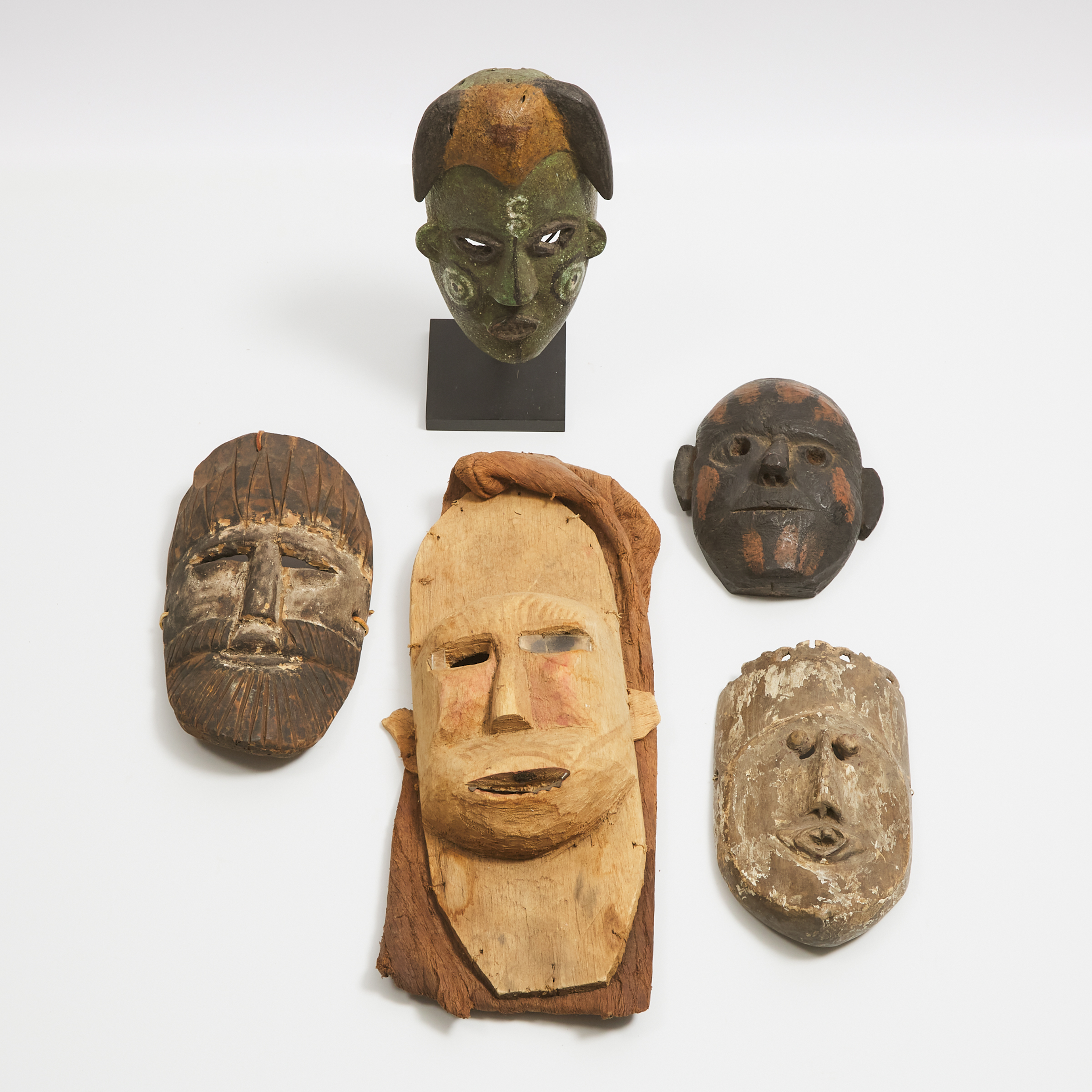 Group of Five Unidentified Masks  3ab850