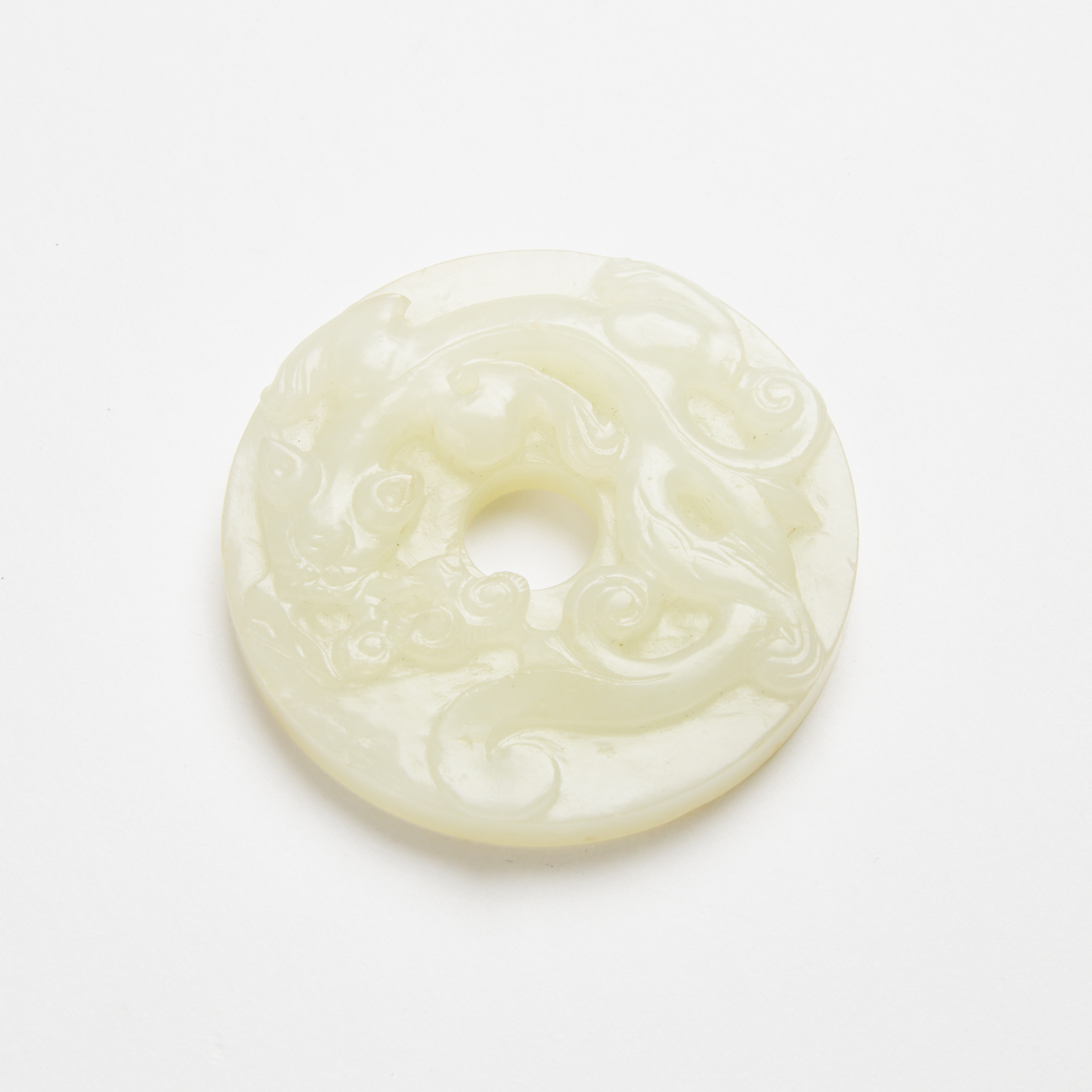 A White Jade 'Chilong' Bi Disc,