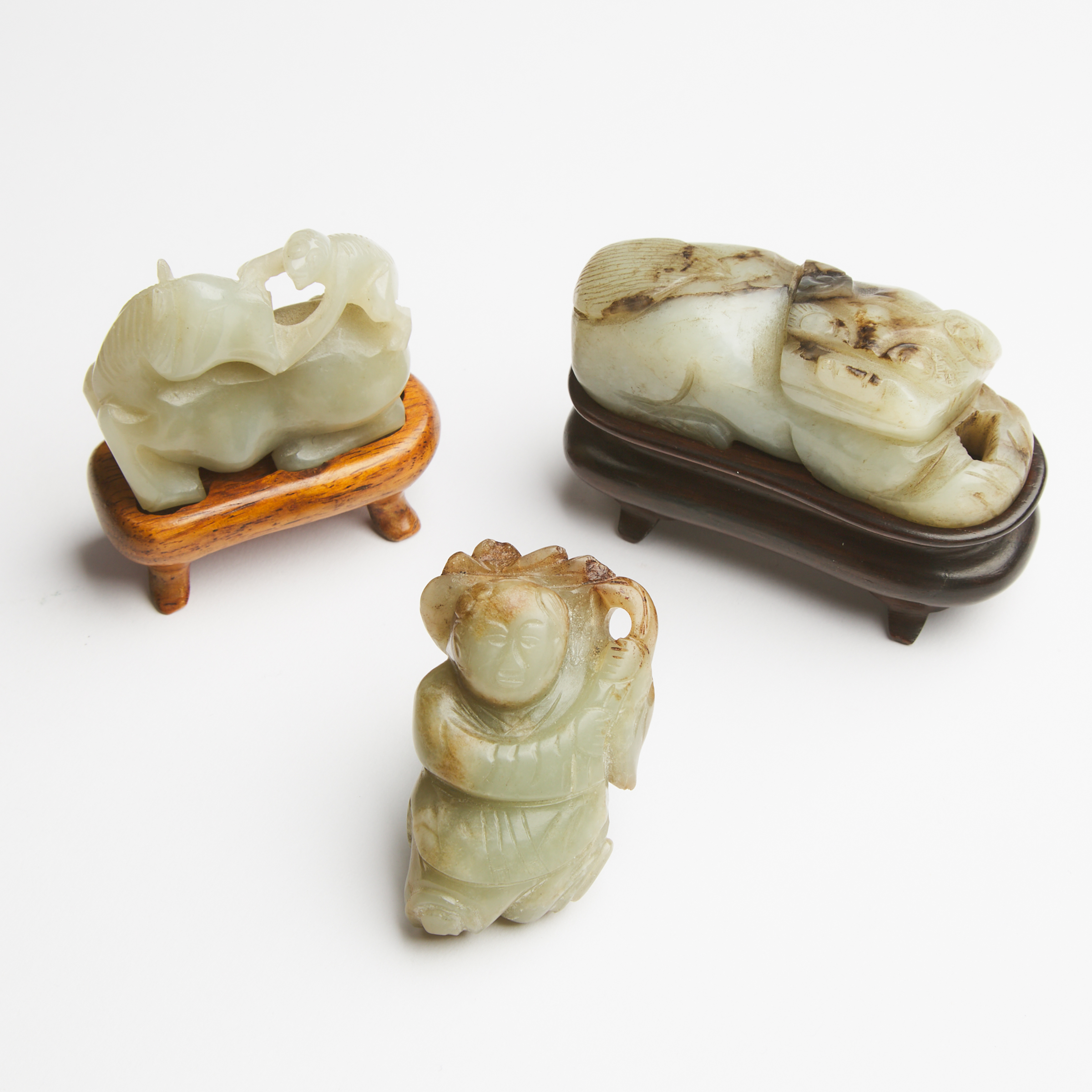 A Group of Three Jade Carvings,