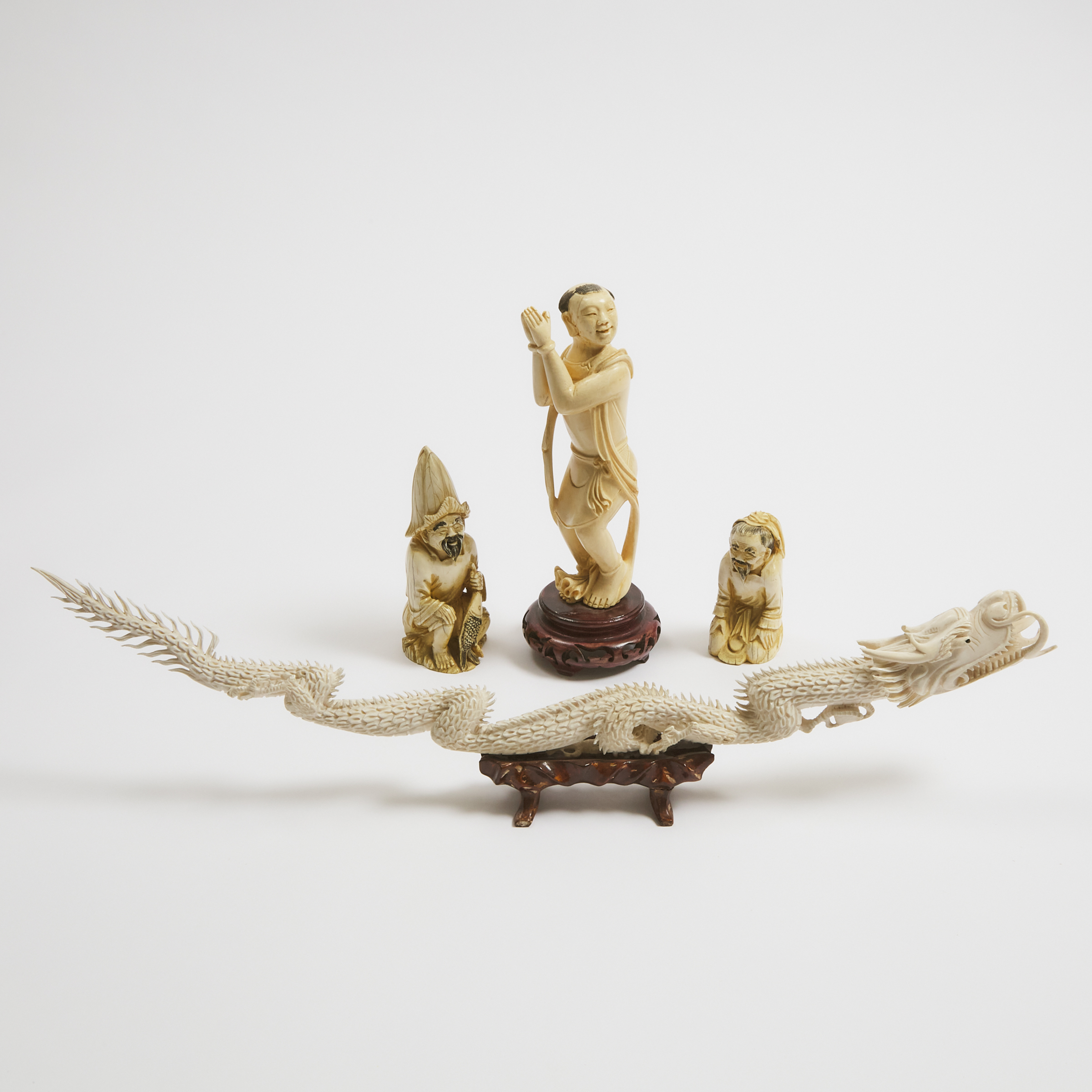 A Group of Four Ivory Carvings,