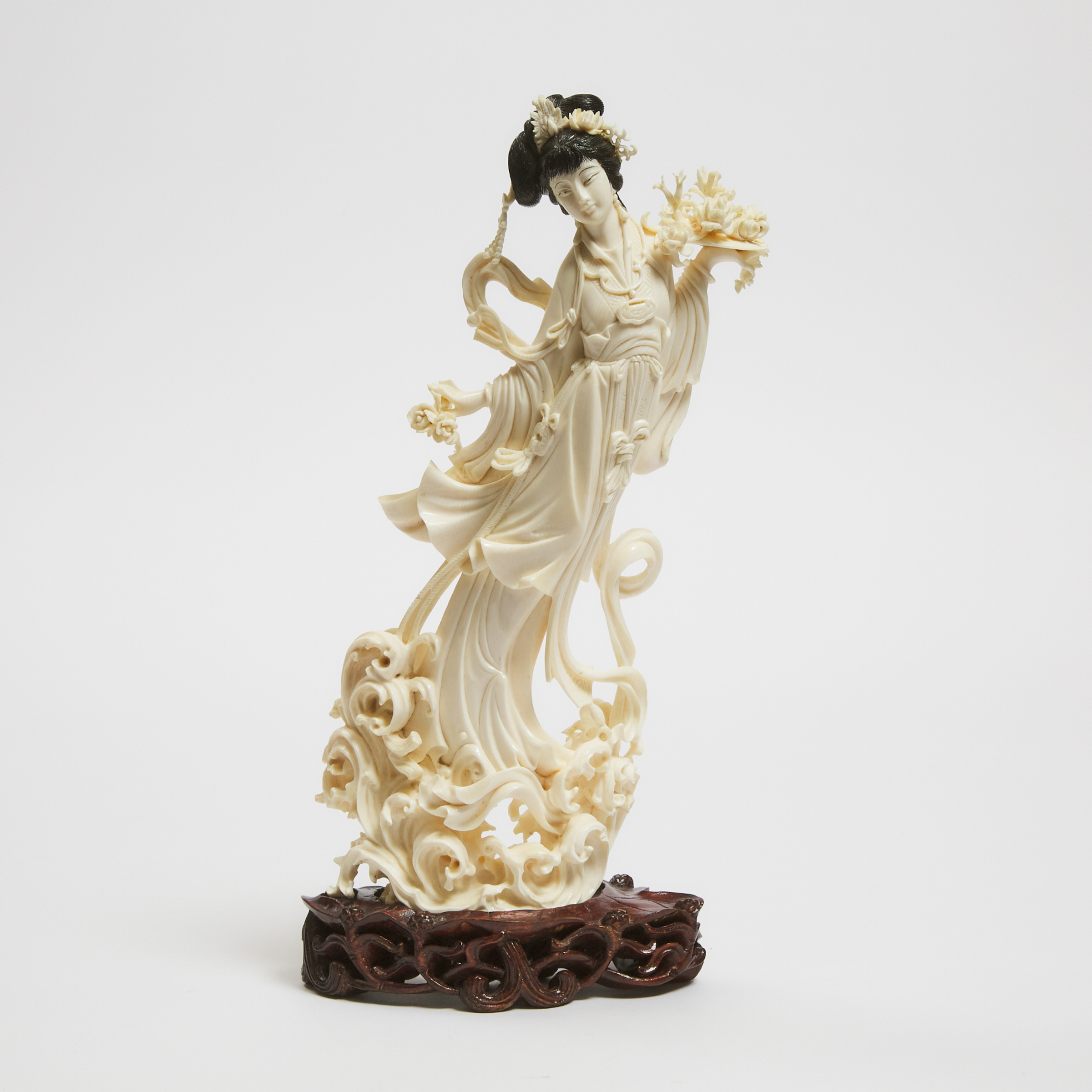 A Chinese Ivory Figure of a Lady,