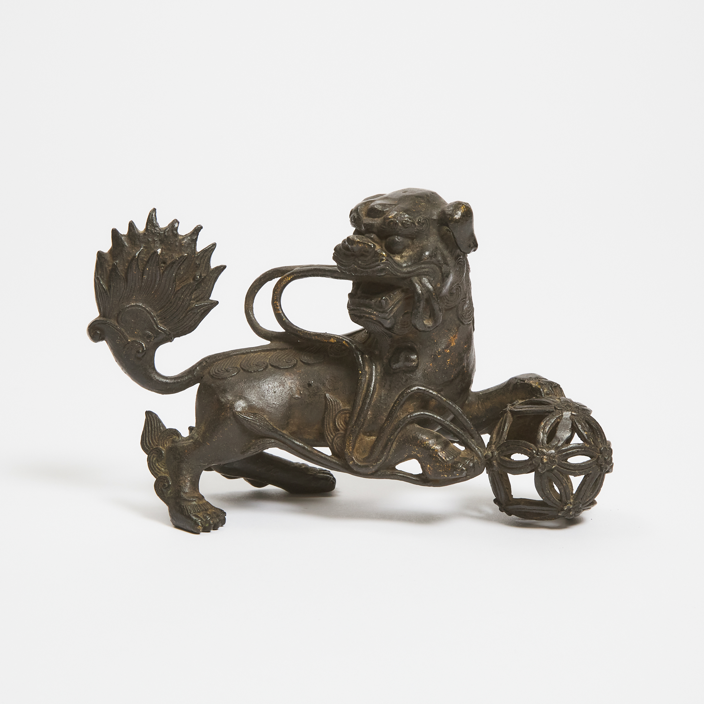A Gilt Bronze Figure of a Lion,