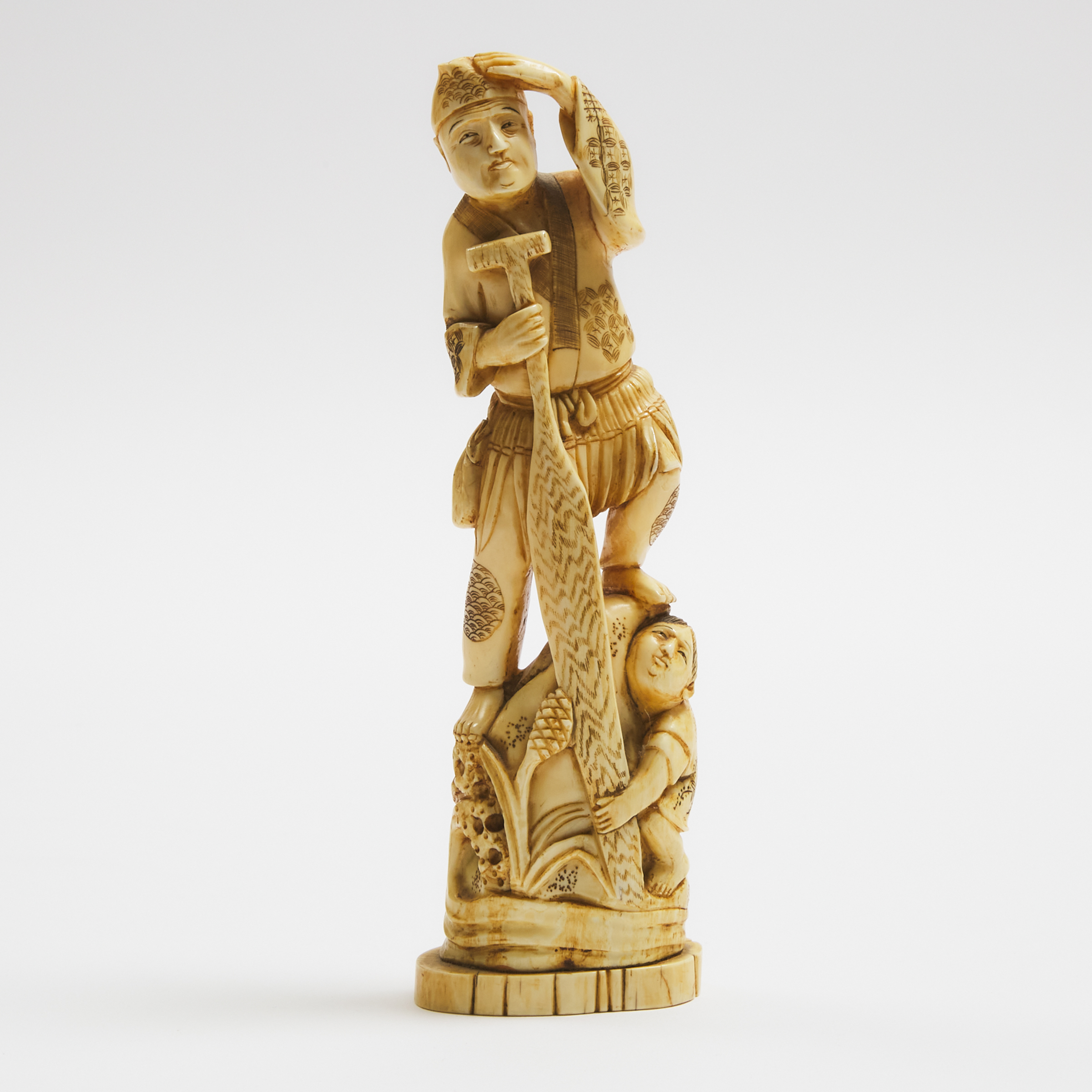 An Ivory Okimono of a Fisherman 3ab923