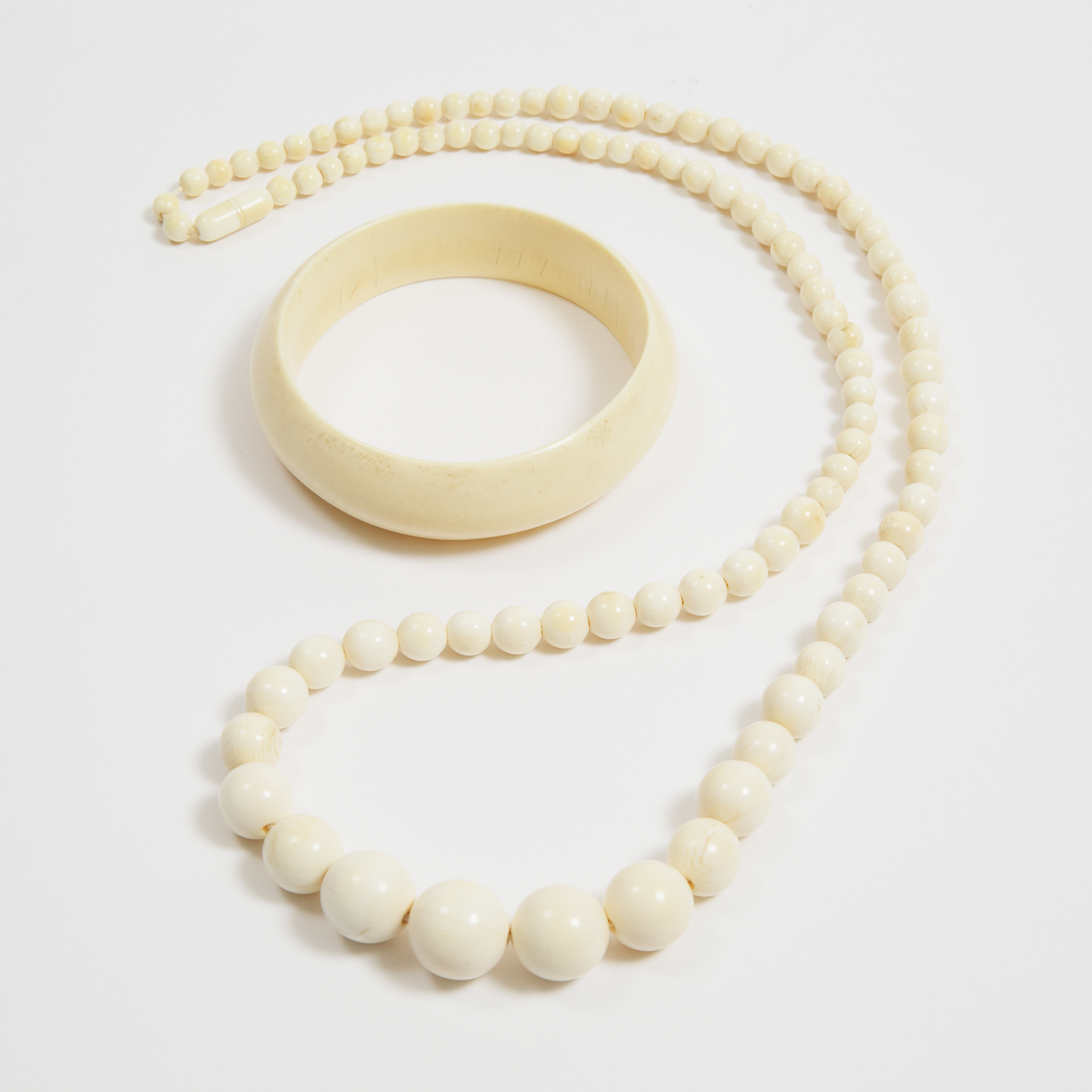 An Ivory Beaded Necklace and Bangle  3ab942