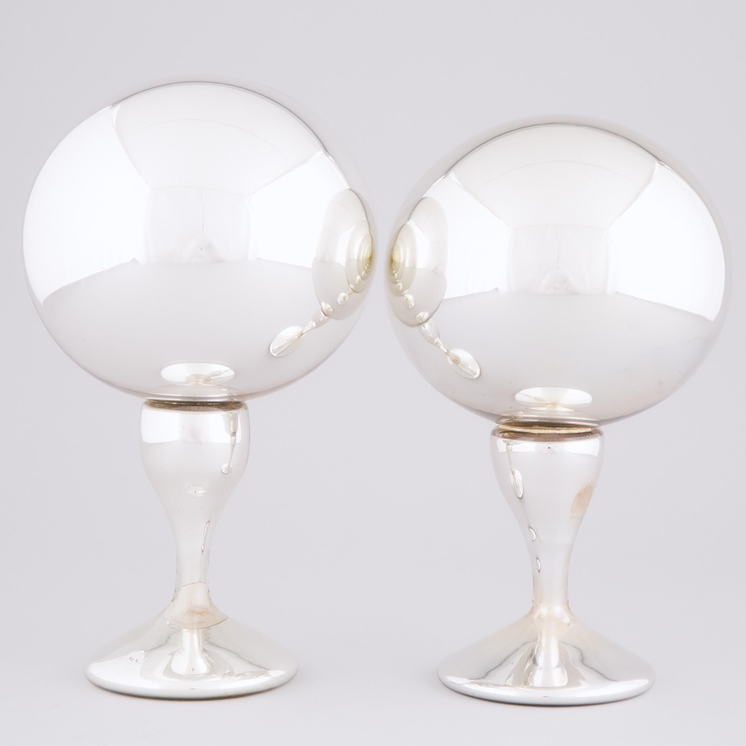 Two Mercury Glass Pedestal-Footed