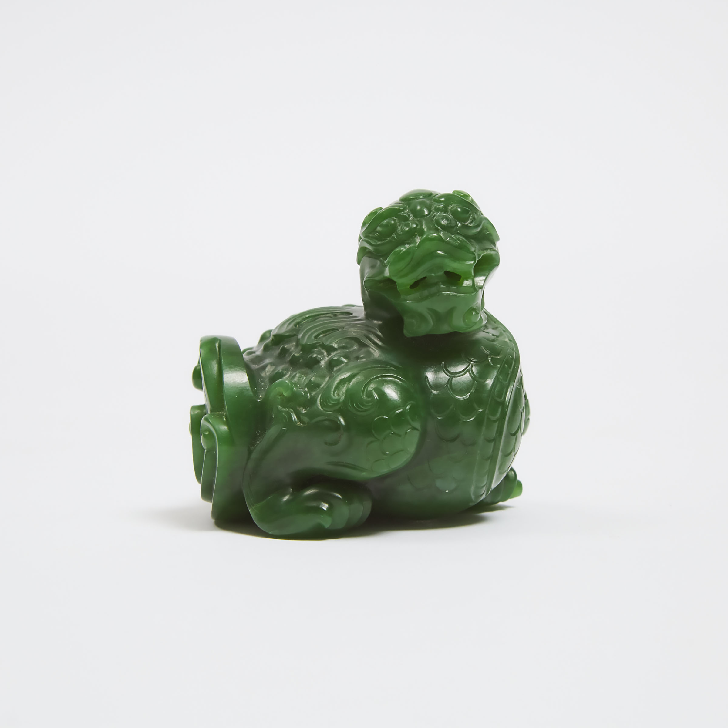 A Spinach Jade Carving of a Bixie,