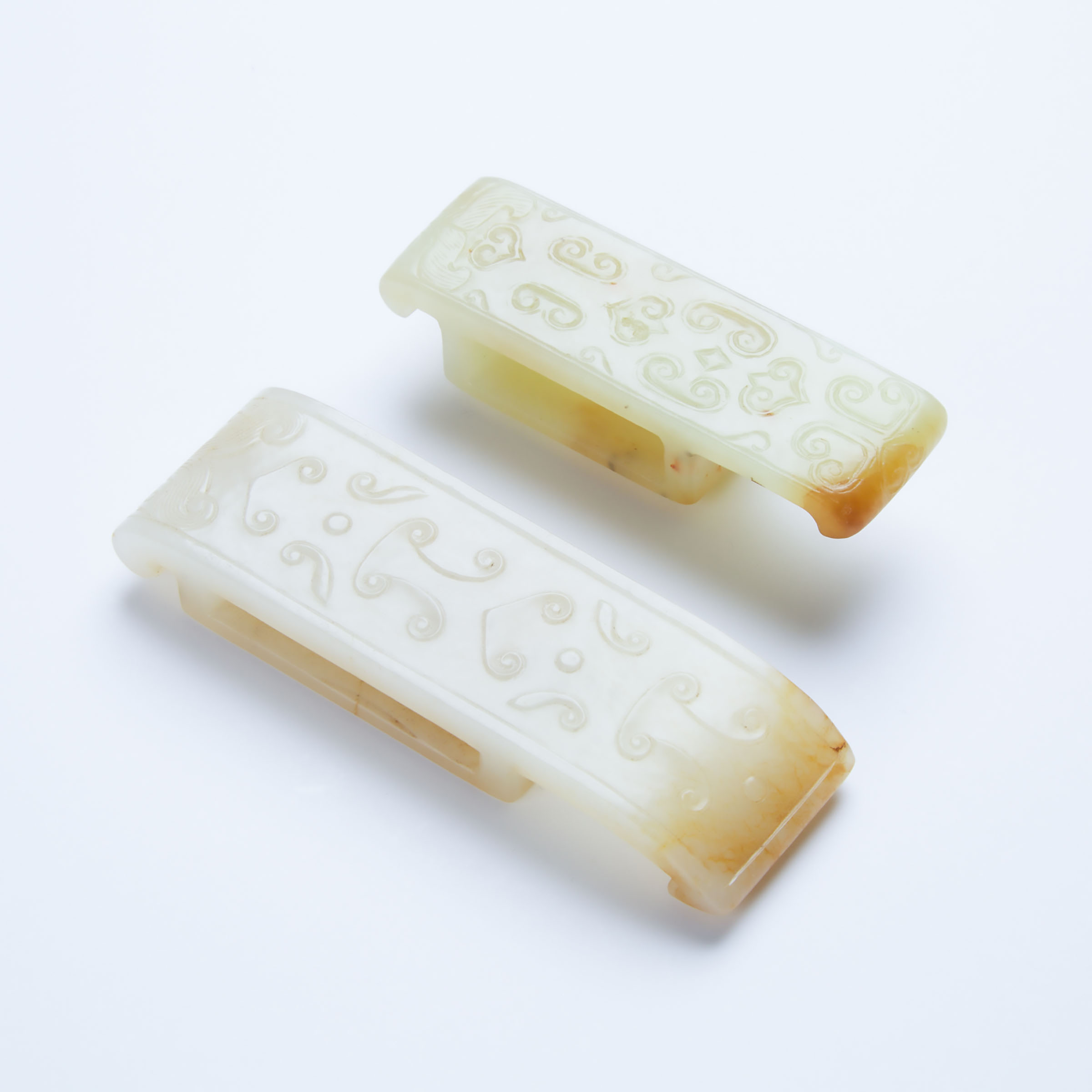 Two White Jade Scabbard Slides,