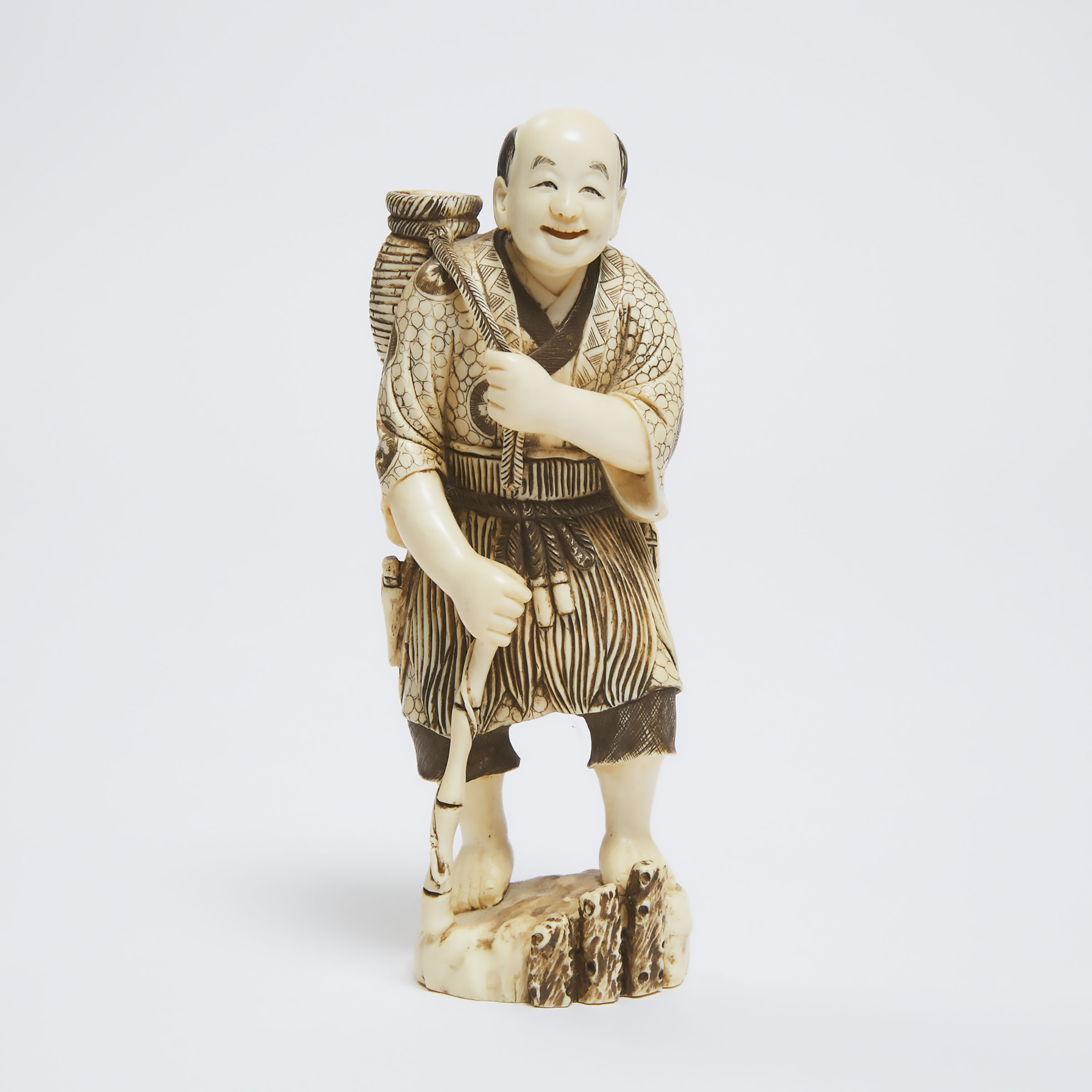 A Tinted Ivory Okimono of a Fisherman  3abbc7