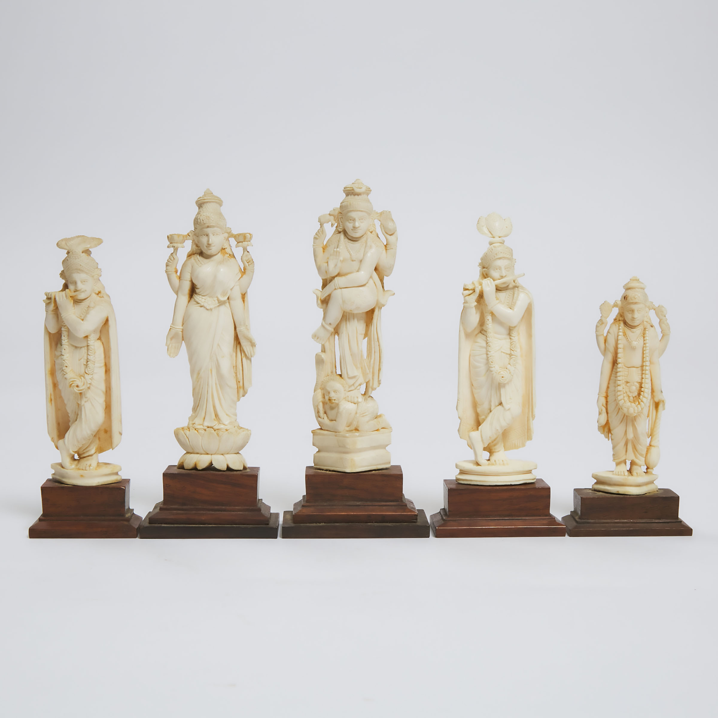 A Group of Five Indian Ivory Figures,