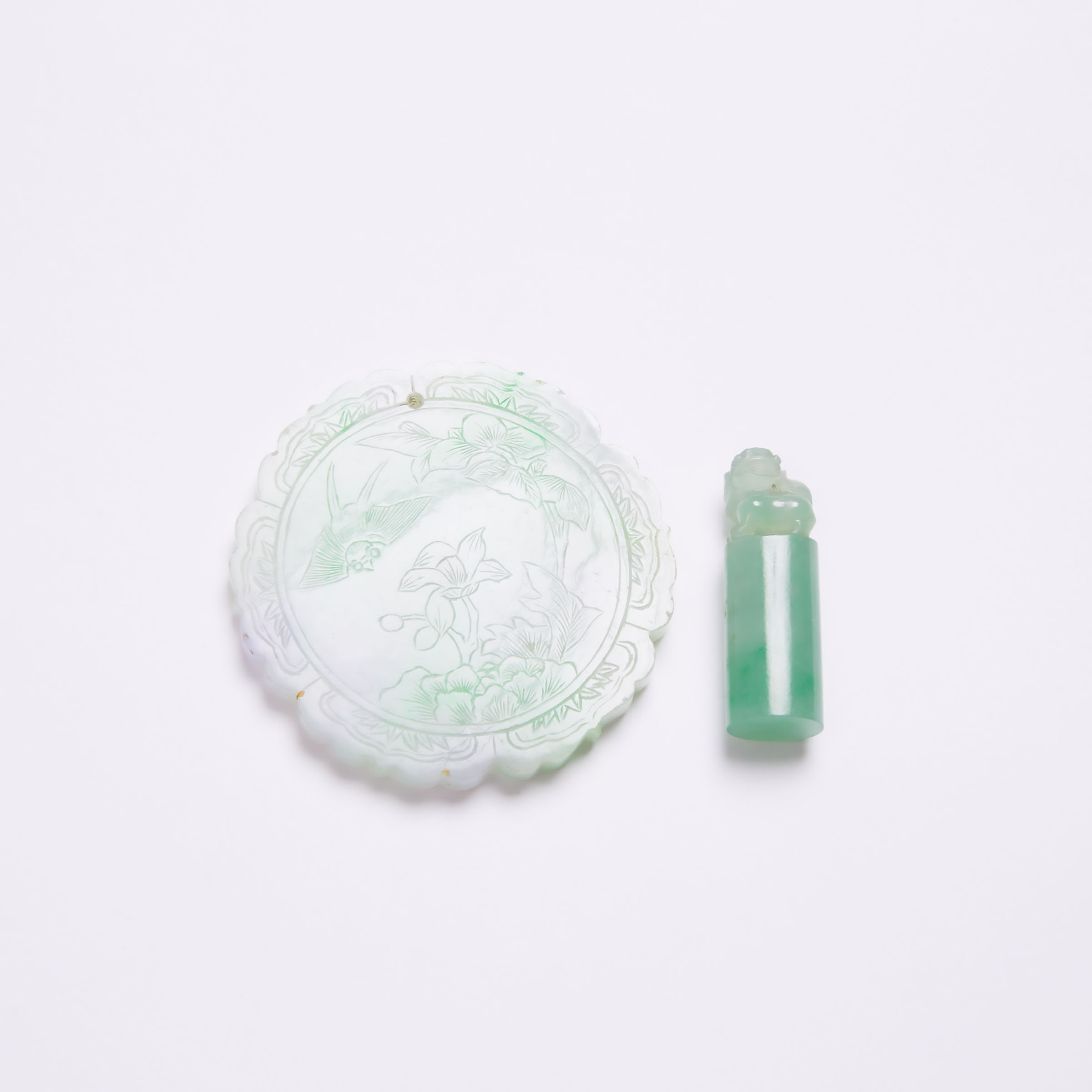 A Carved Lavender and Green Jadeite 3abc02