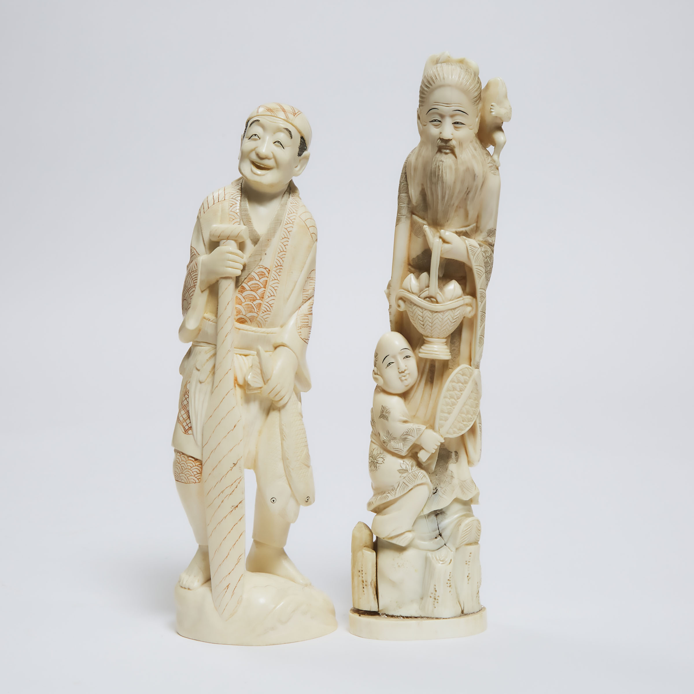 Two Ivory Okimono of a Fisherman