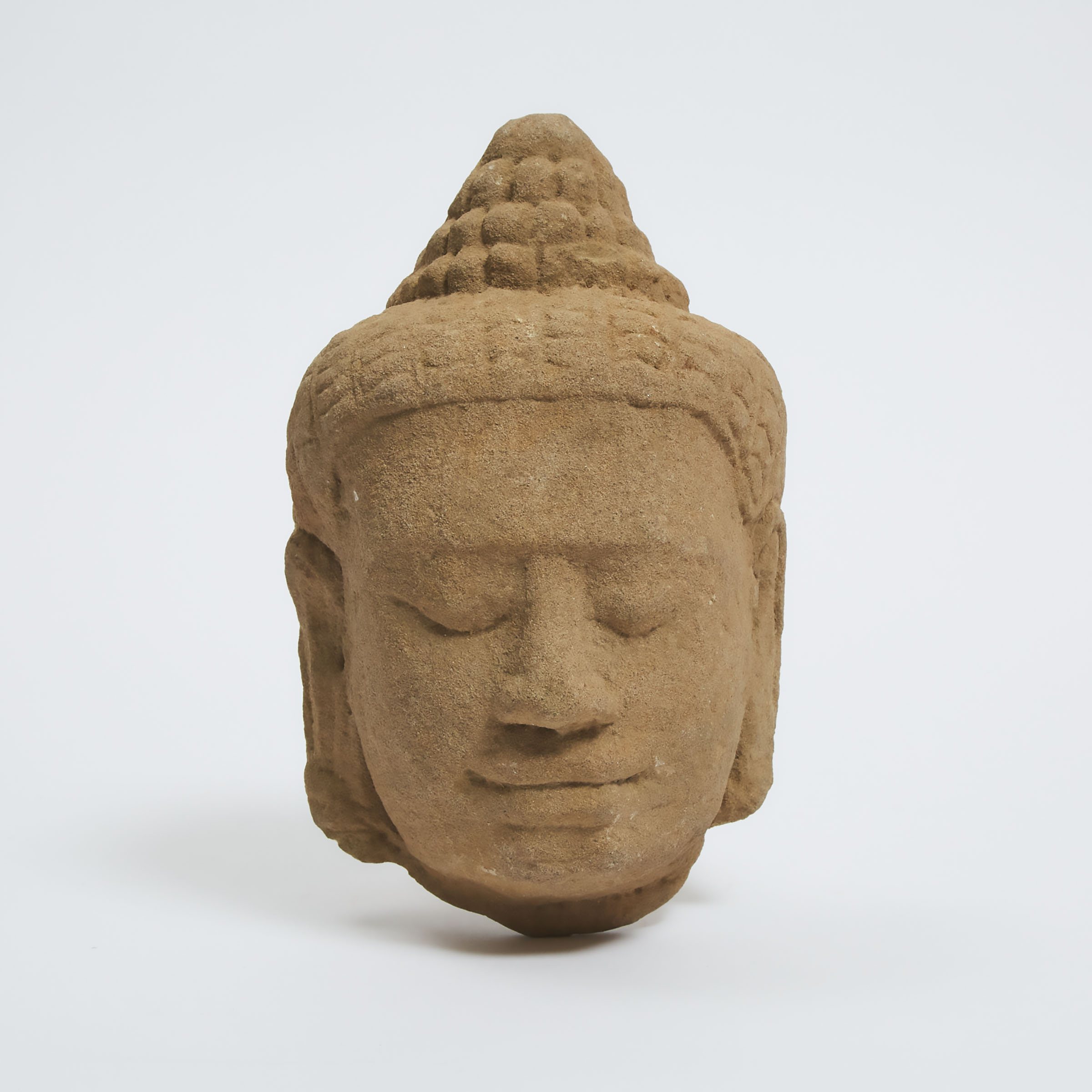 A Khmer Sandstone Head of a Deity,