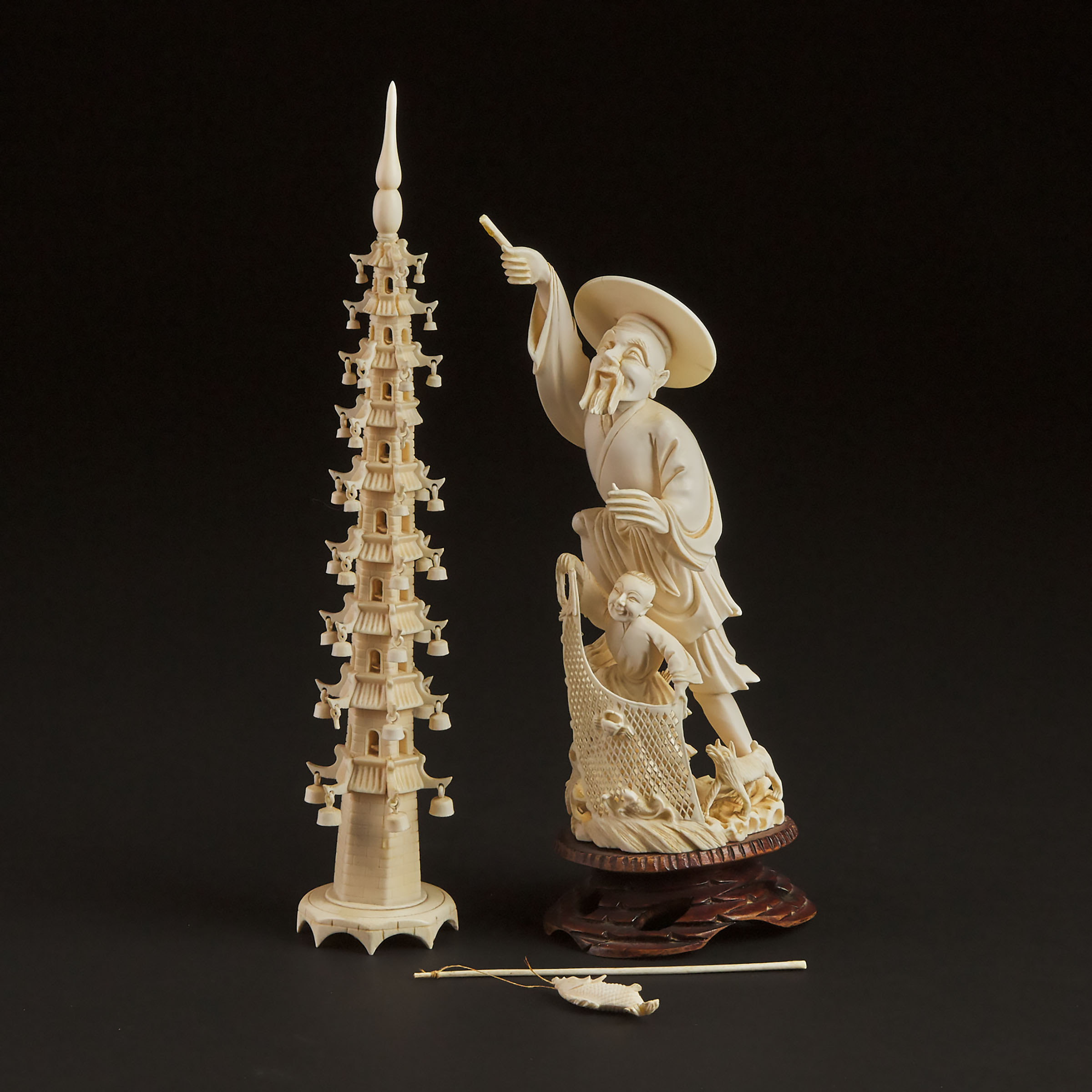 A Carved Ivory Fisherman Group  3abc53