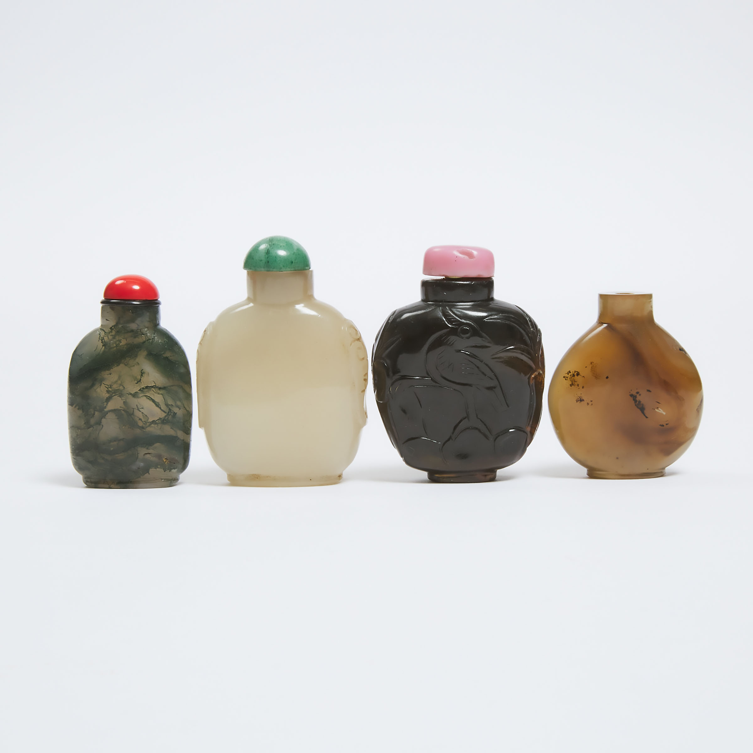 A Group of Four Agate Snuff Bottles,