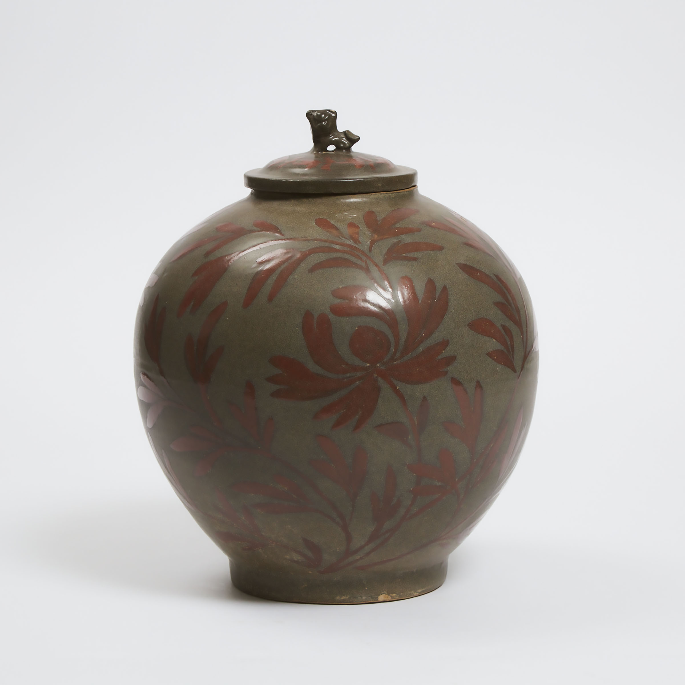 A Korean Celadon-Glazed Jar and