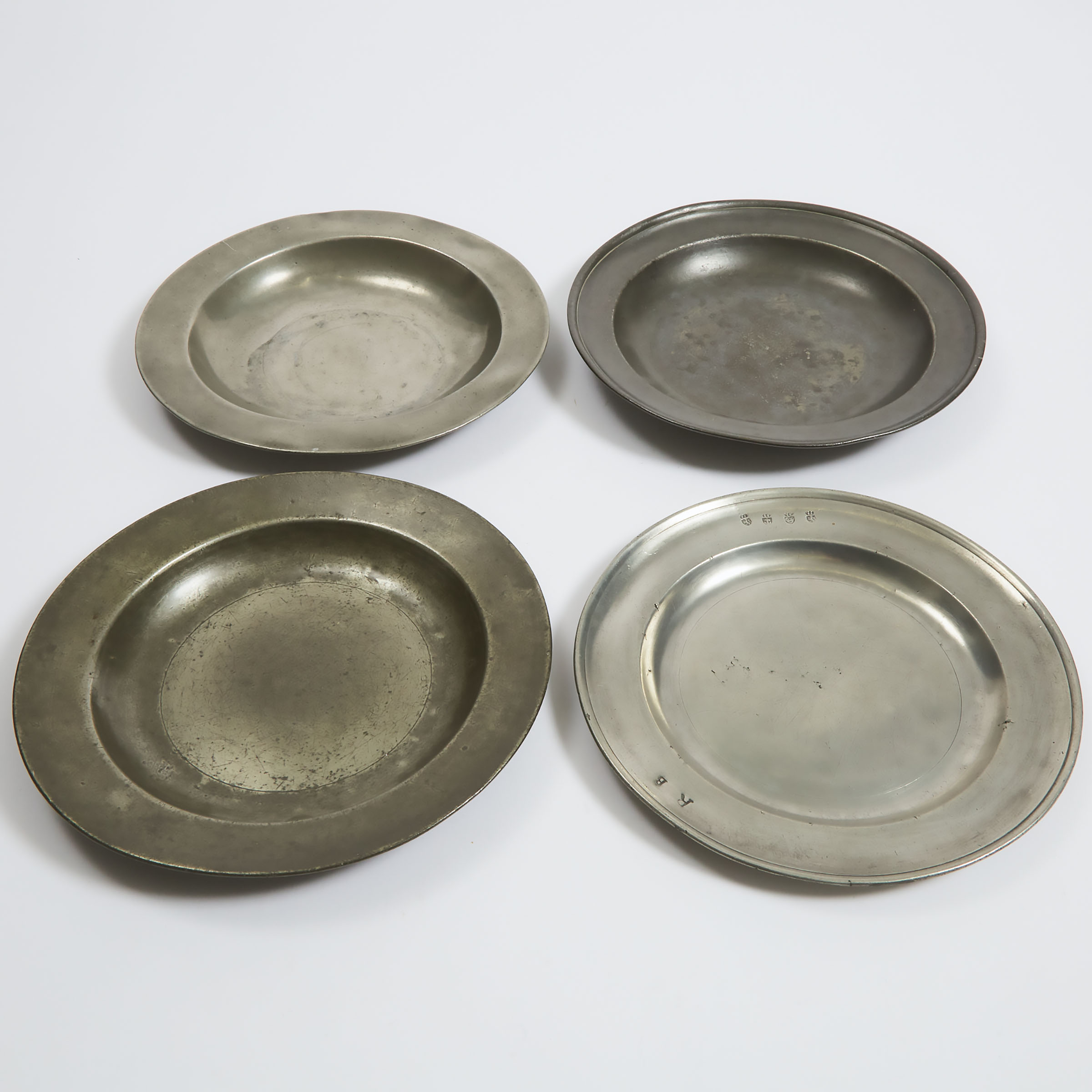 Four Early English Pewter Plates,