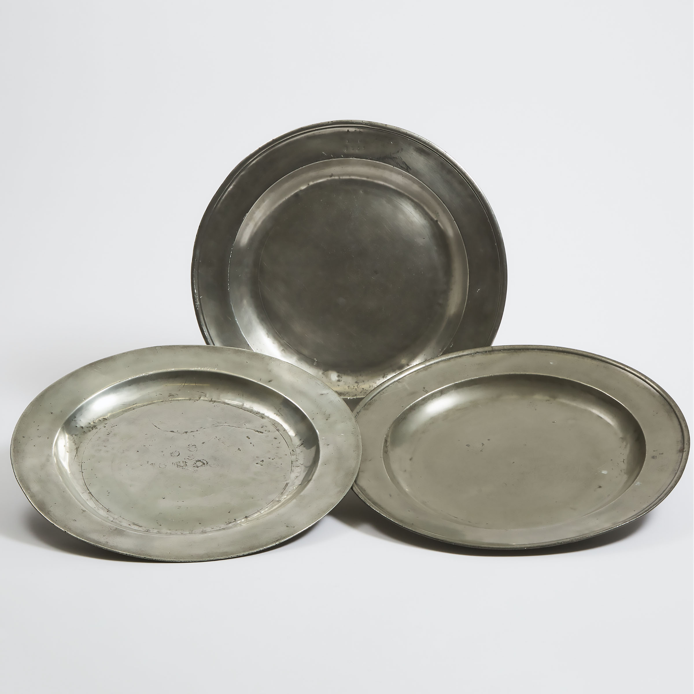 Three Large English Pewter Dishes,