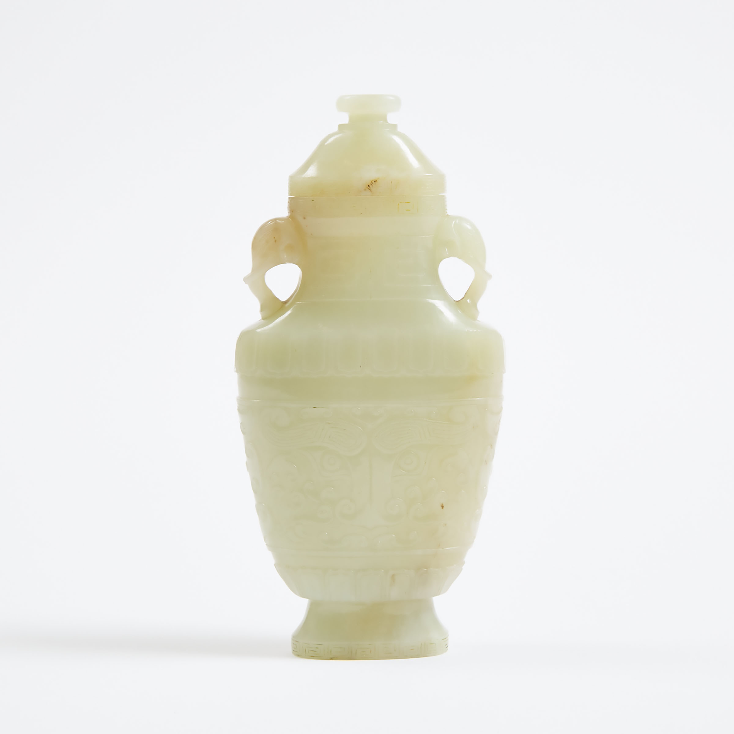 A White Jade Archaistic Vase and
