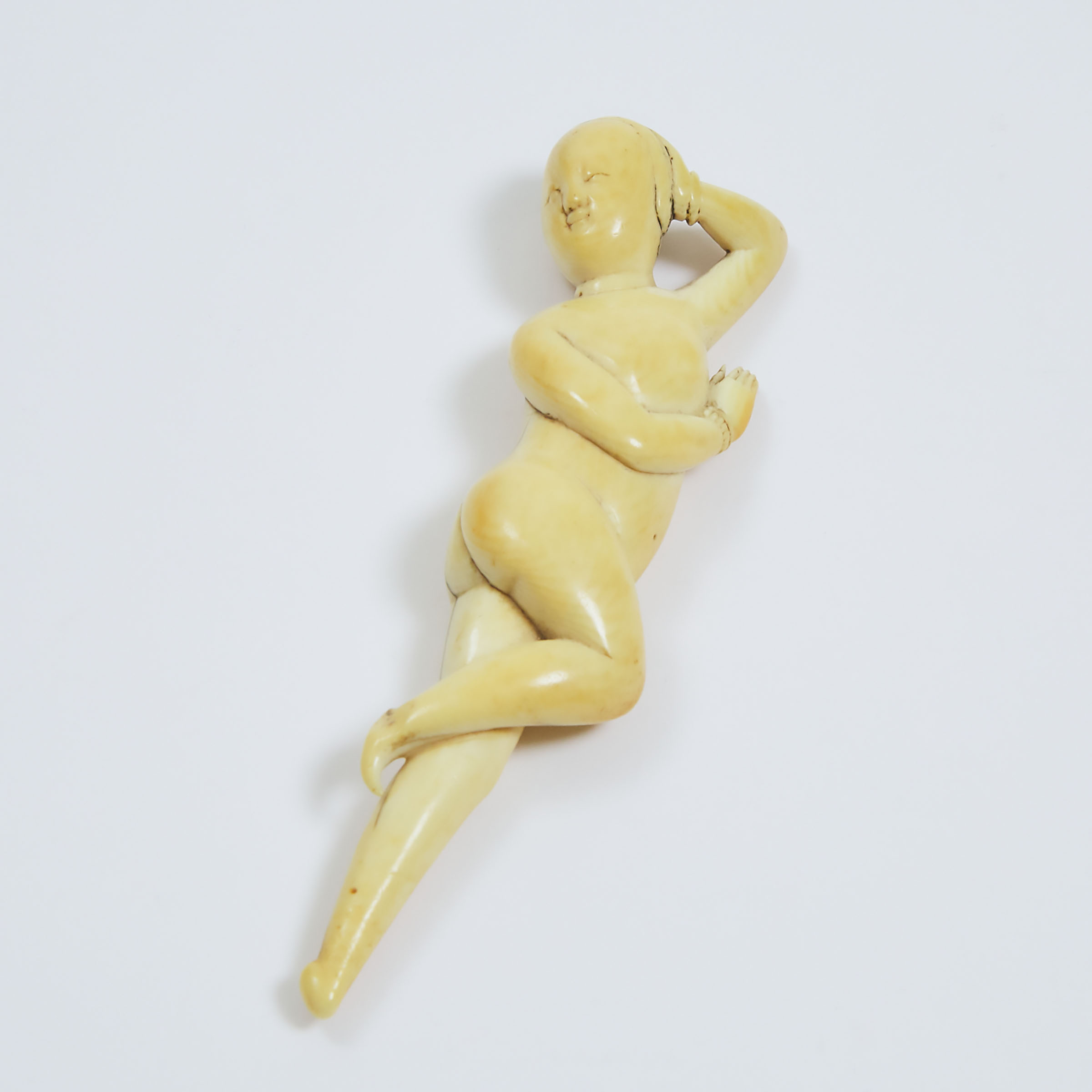 A Chinese Ivory Figure of a Reclining 3abda9