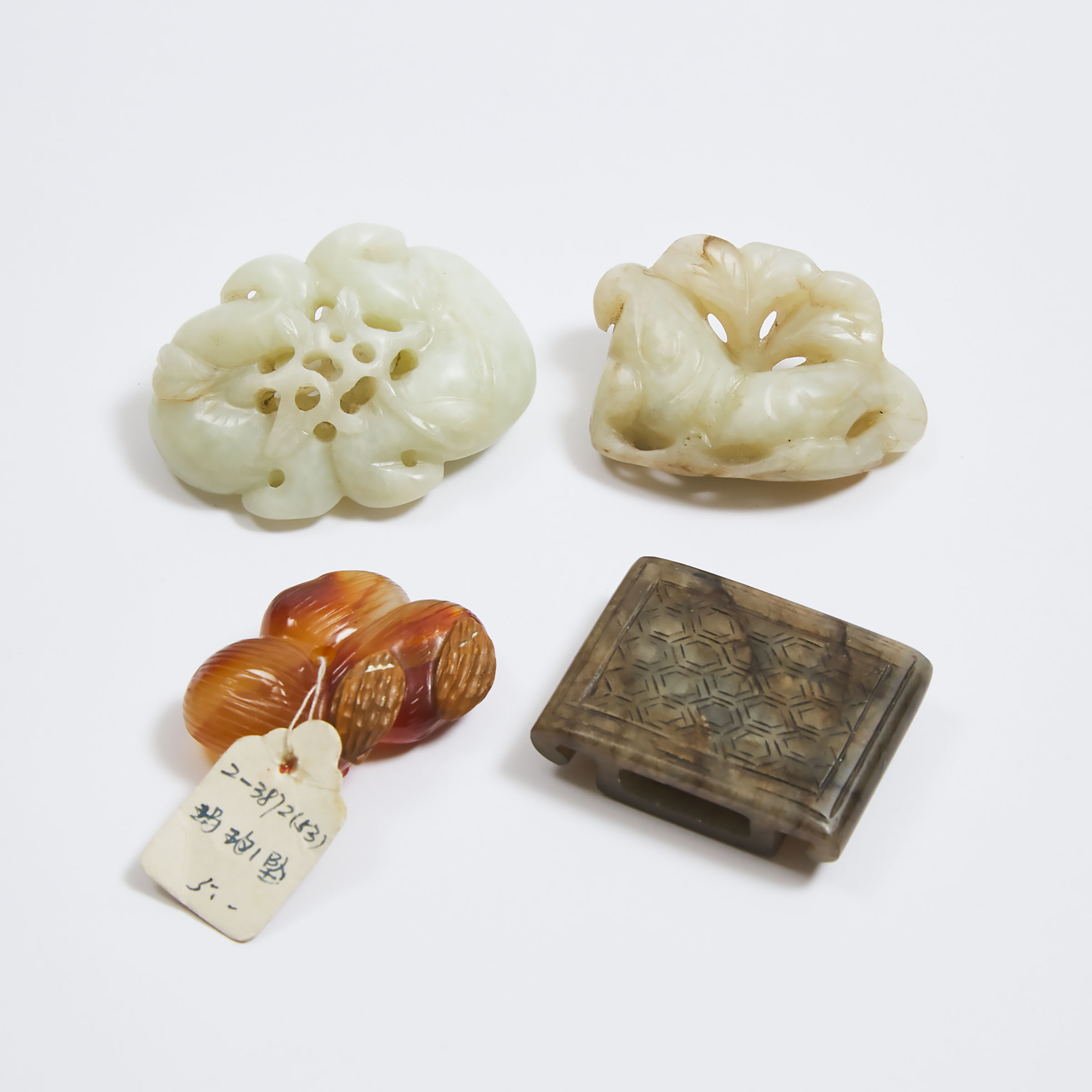 A Group of Three Jade Carvings  3abdda