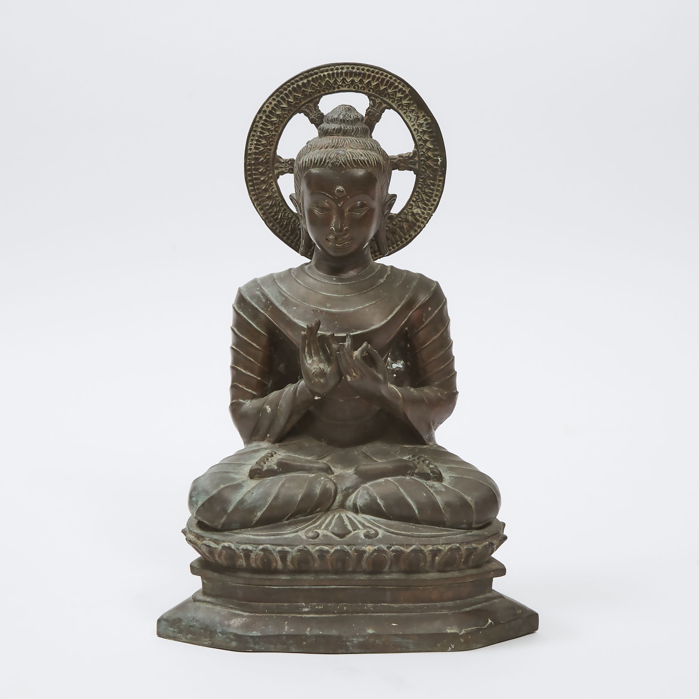 A Large Bronze Seated Figure of