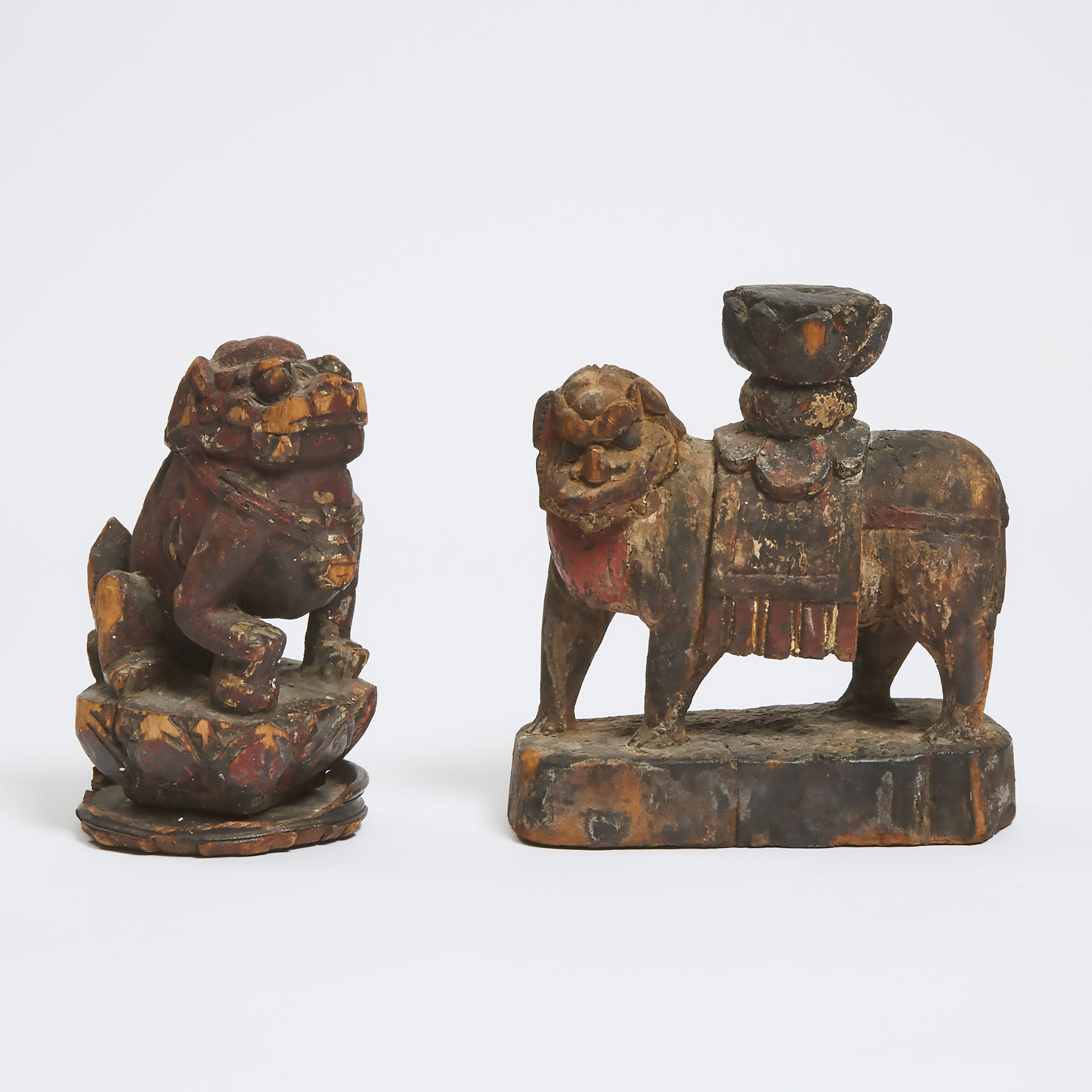 Two Gilt Wood Figures of Lions, Possibly