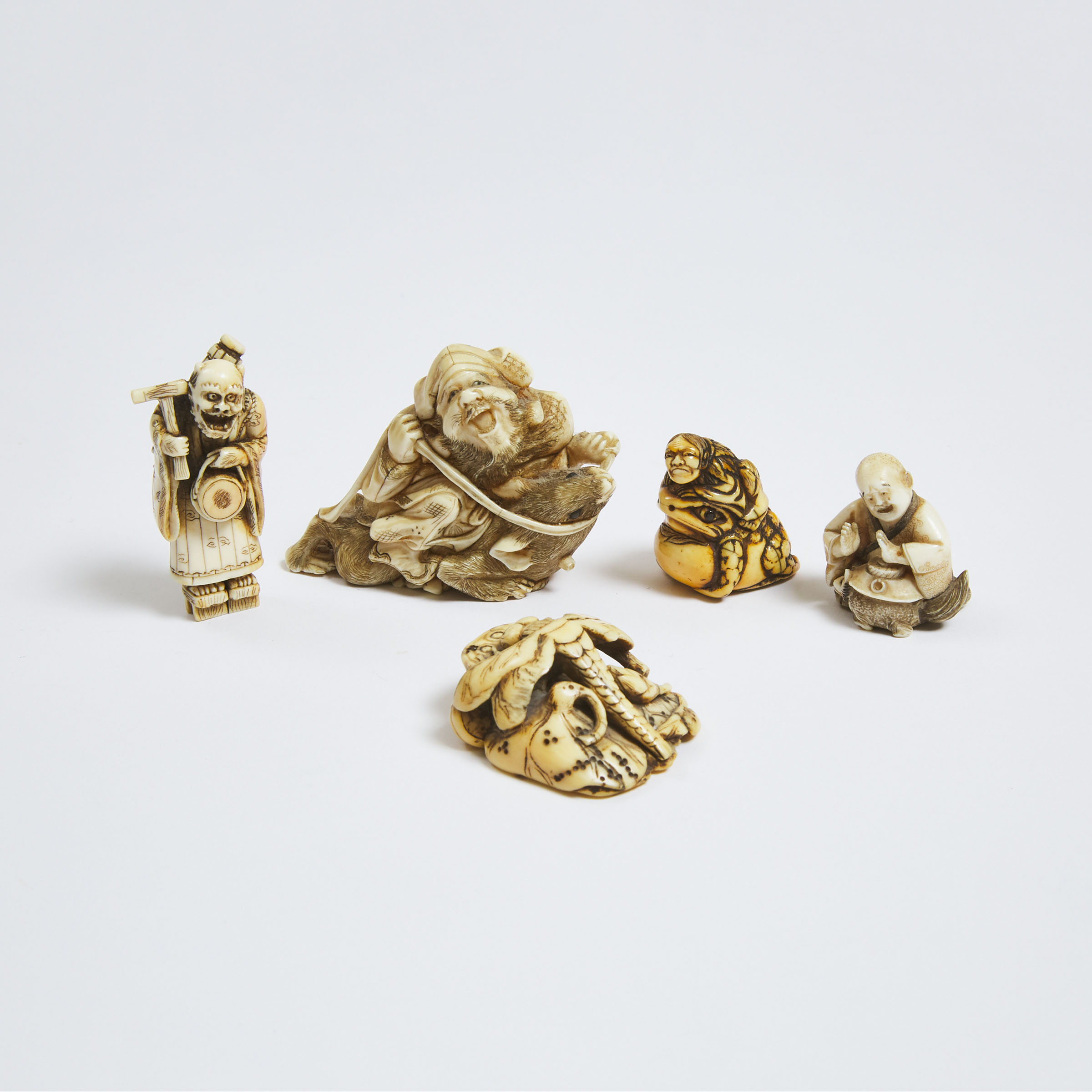 Four Ivory Netsuke of a Repentant Oni,