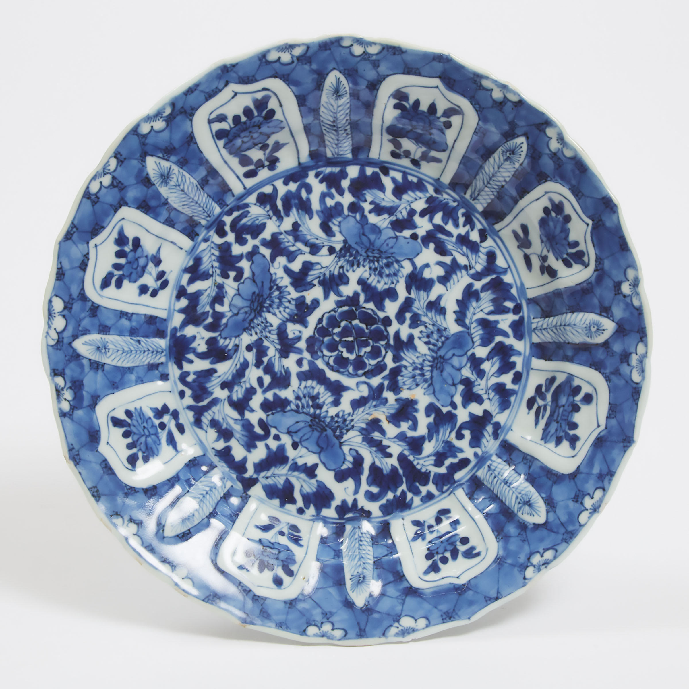 A Moulded Blue and White Barbed-Rim