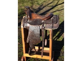 Vintage tooled leather western saddle,