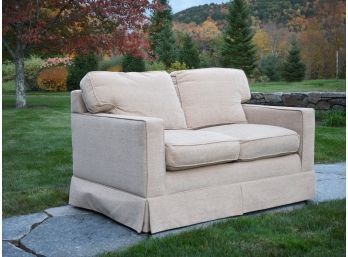 A contemporary beige upholstered