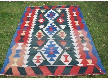 A vintage Kilim area rug in bold 3aa4c2