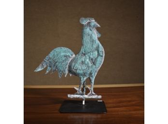 A small vintage copper rooster
