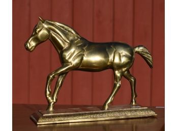 A contemporary cast brass horse