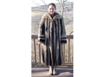 A vintage raccoon fur coat, labeled
