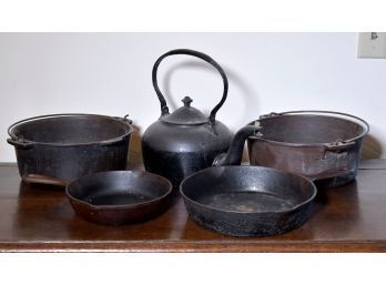 Vintage cast iron kitchen ware including: