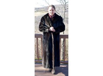 A modern long mink fur coat labeled 3aa574