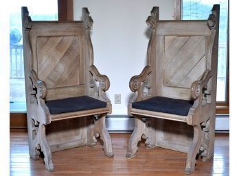 A pair of oak Bishops/altar chairs