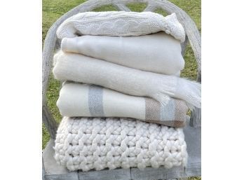 Five blankets including: Coyuchi blanket,