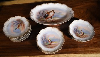 Set of eleven antique hand painted plates