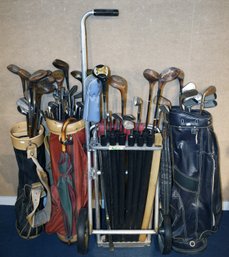 Collection of vintage golf clubs with