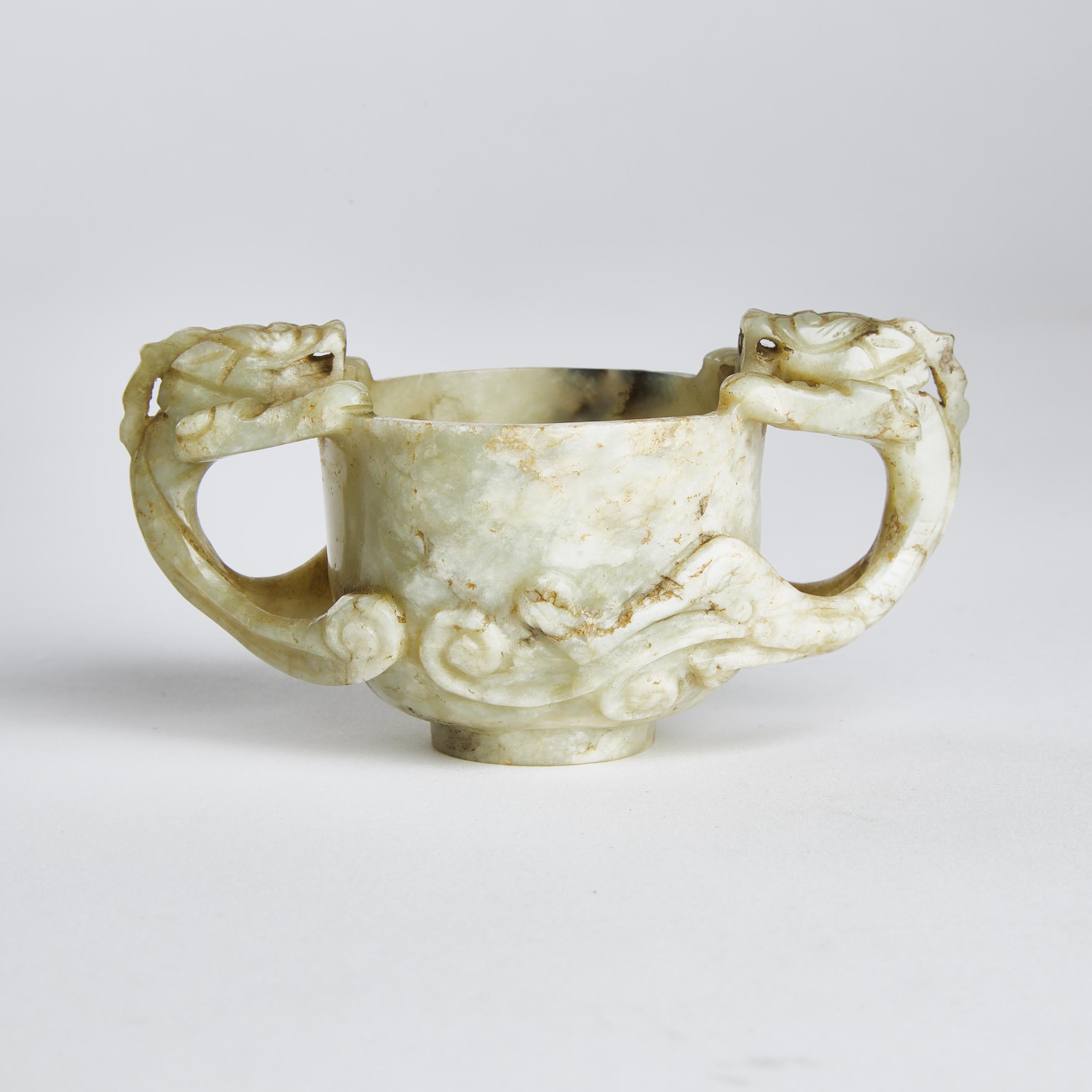 A White and Russet Jade Chilong Cup,