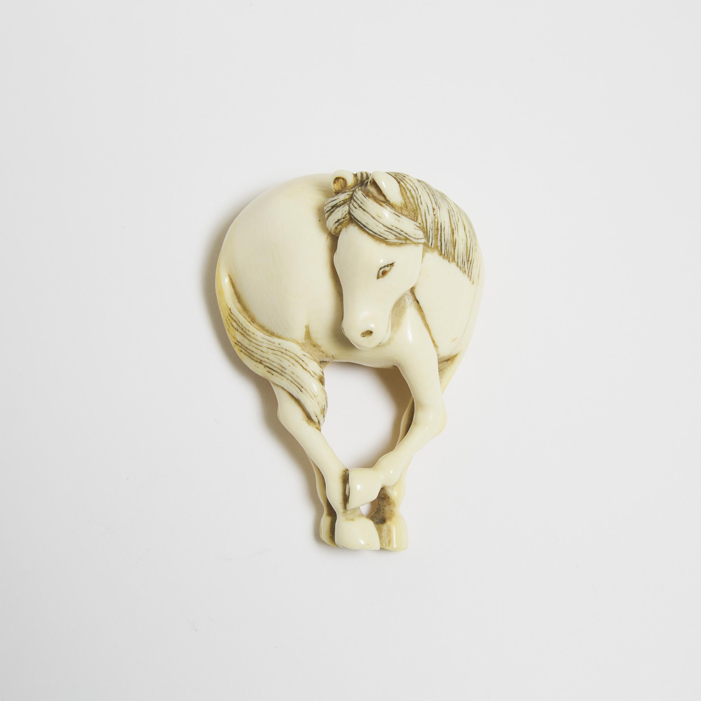 An Ivory Netsuke of a Standing White