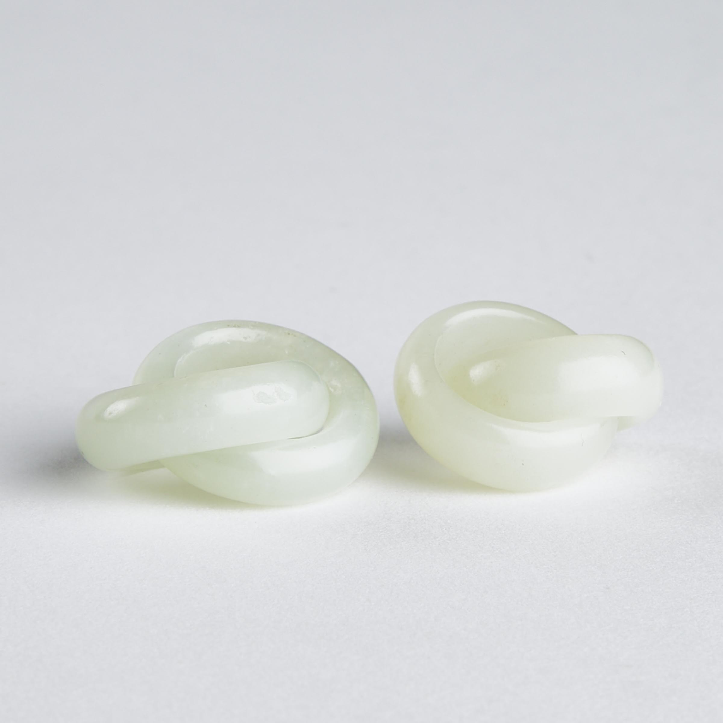 A Pair of White Jade 'Double-Hoop'