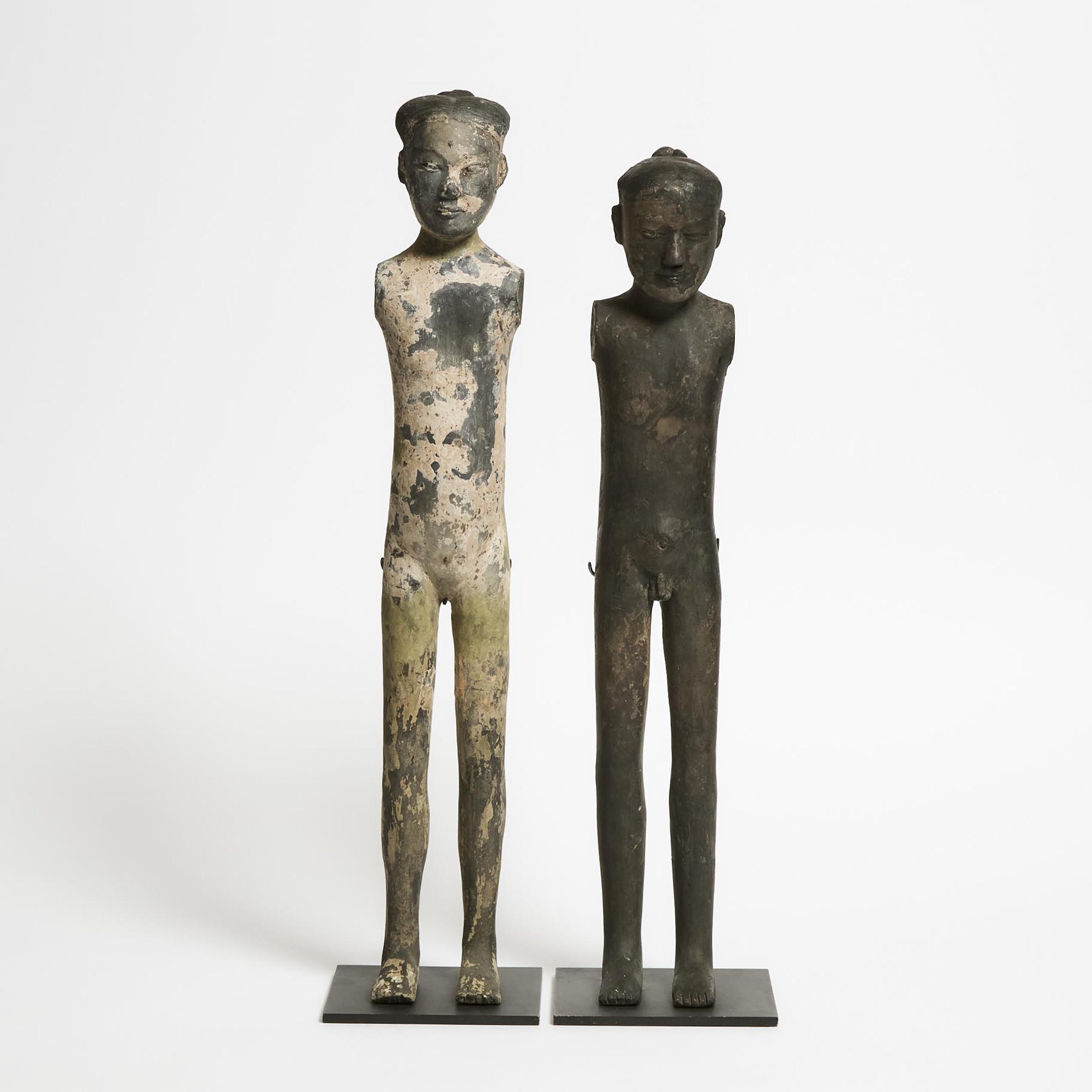 Two Pottery Figures of a Female