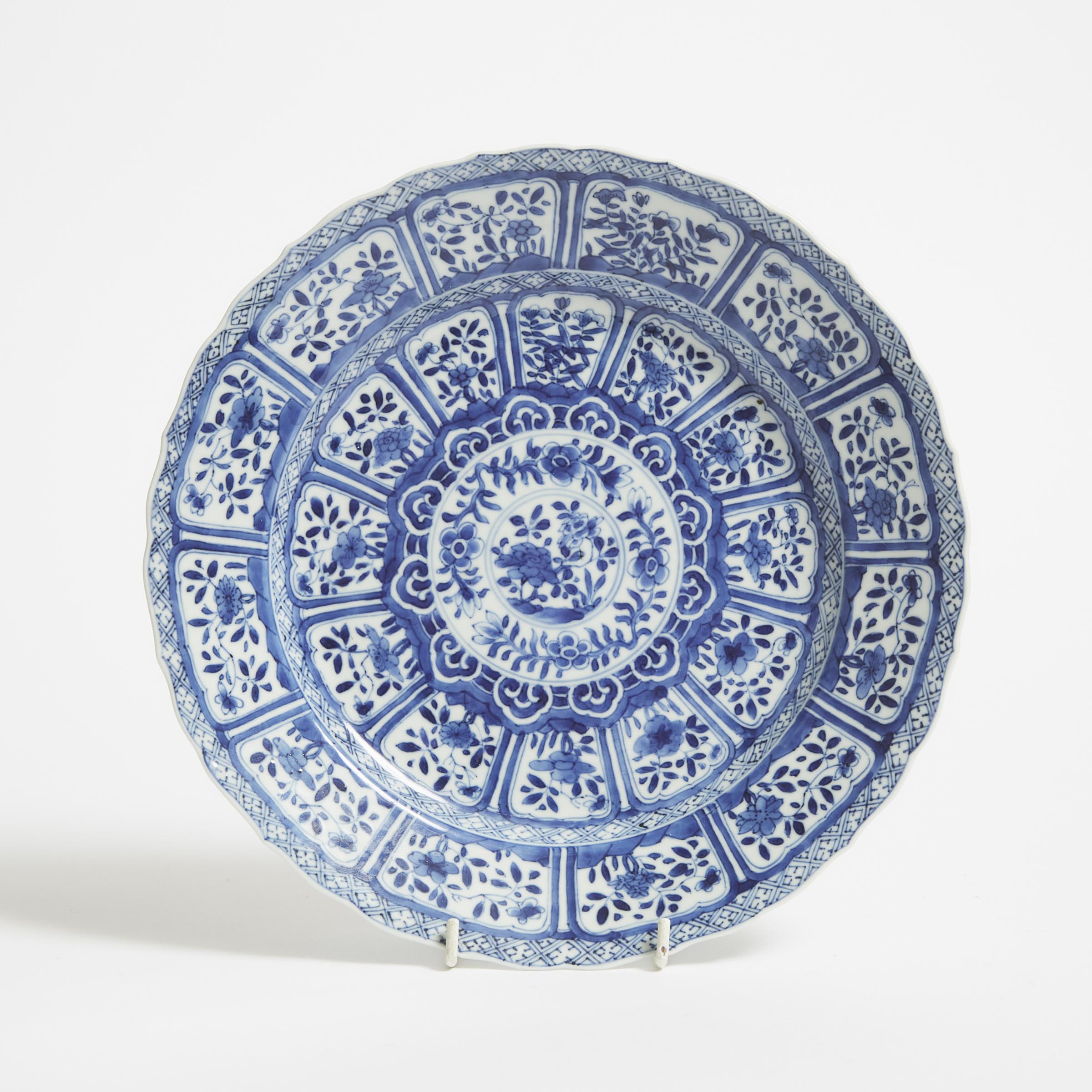 A Blue and White 'Floral' Barbed-Rim