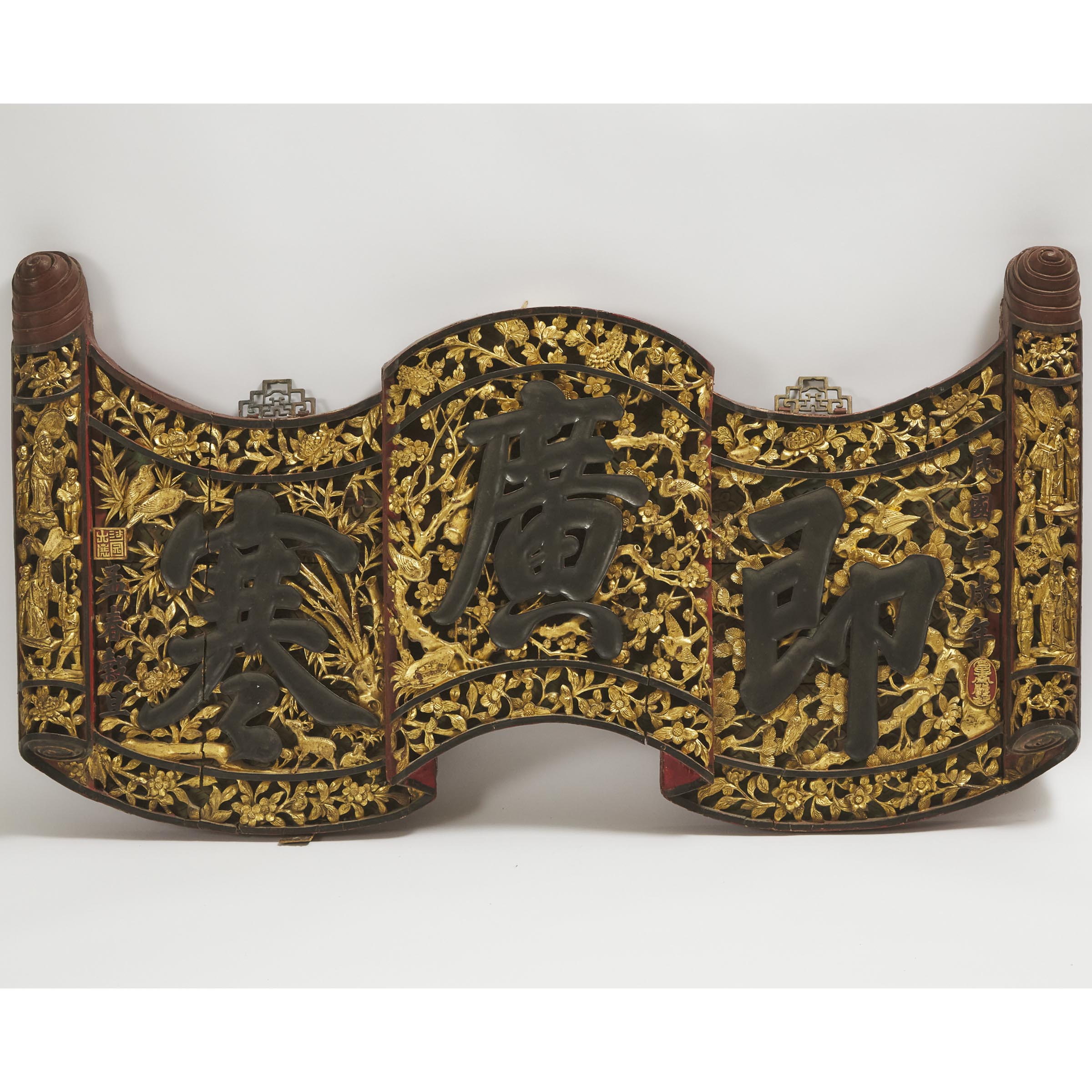 A Large Reticulated Gilt Wood Scroll-Form